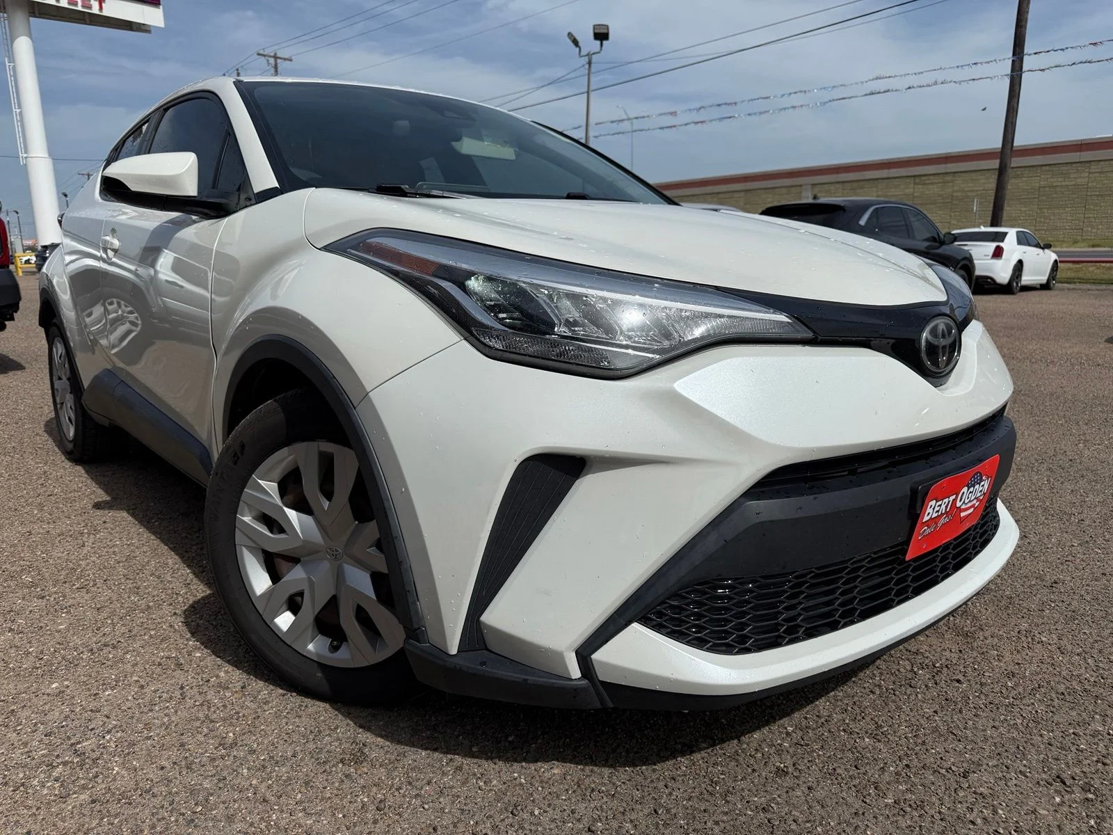 Used 2021 White Toyota LE image 1
