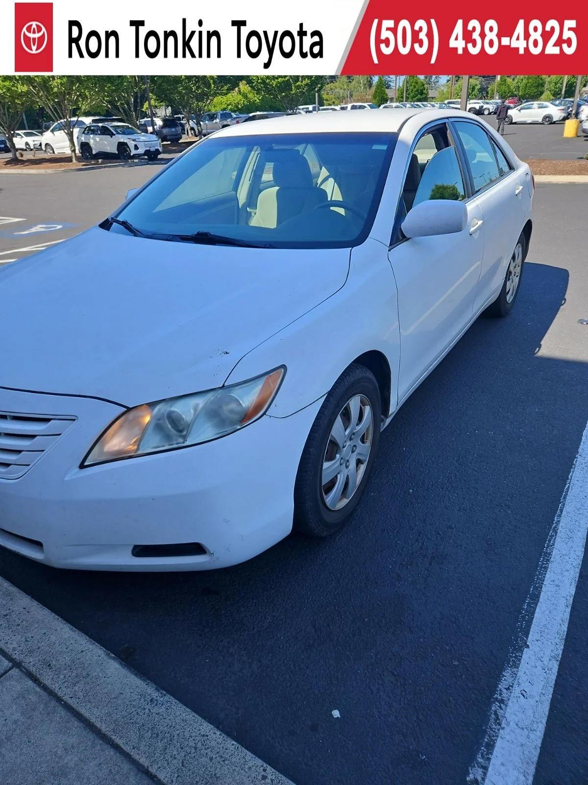 Used 2009 Super White Toyota LE image 1