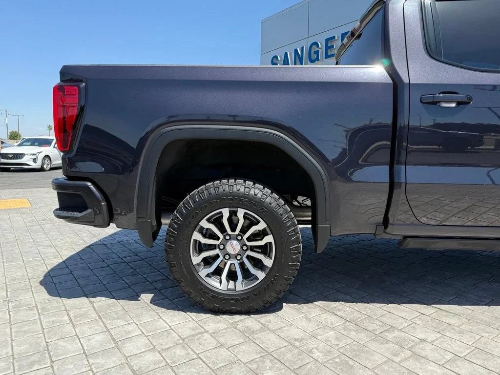 Used 2023 Titanium Rush Metallic GMC AT4 image 11