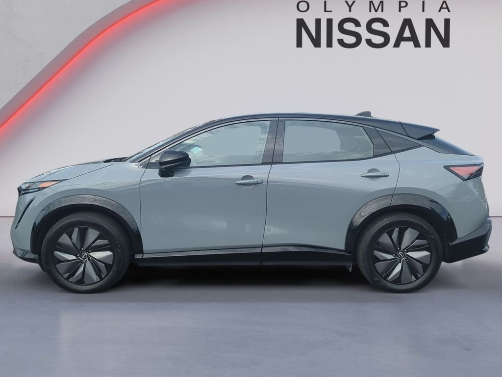 Used 2024 Gray Nissan EVOLVE+ e-4ORCE image 3
