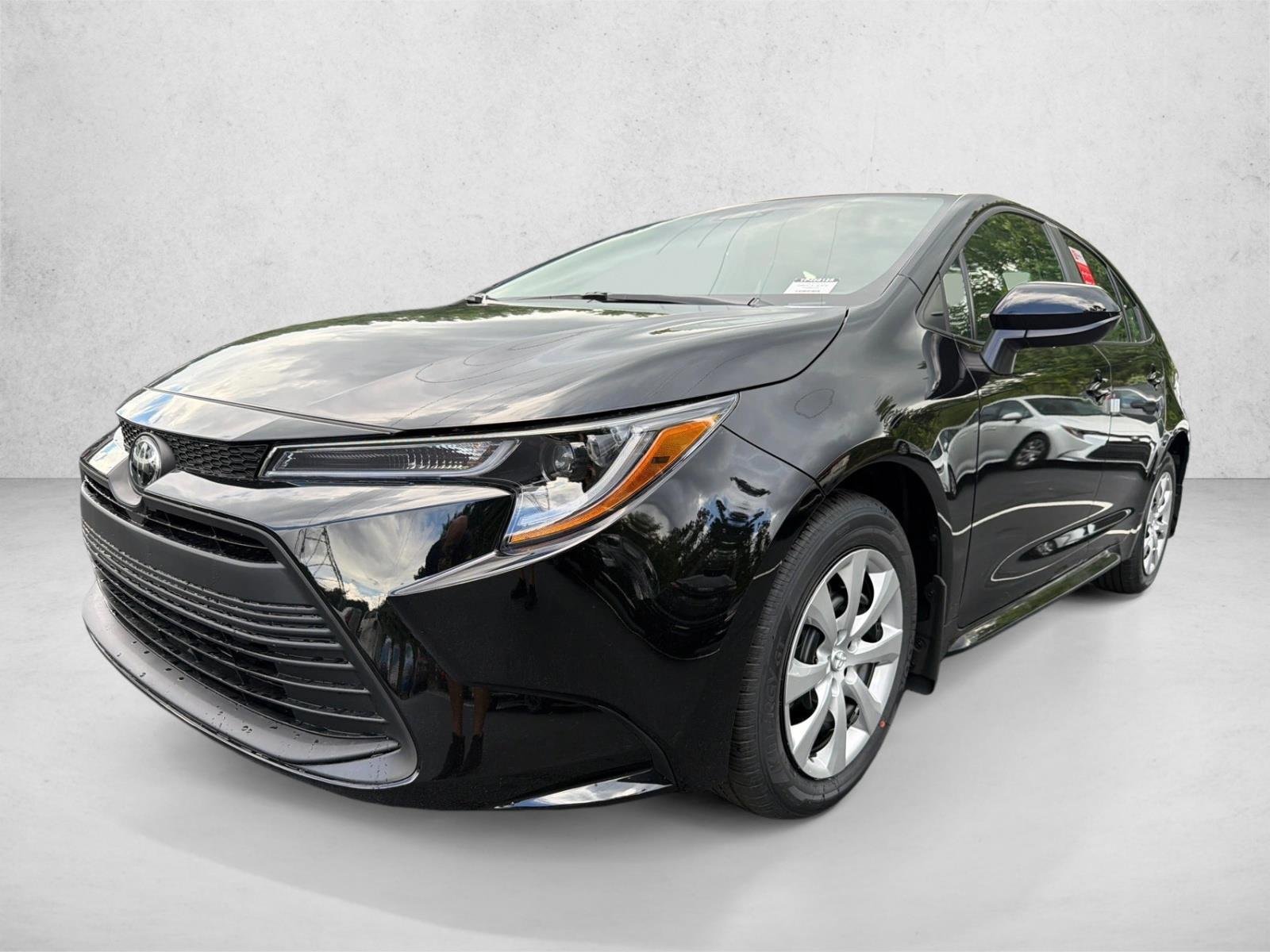 New 2026 Midnight Black Metallic Toyota LE image 7