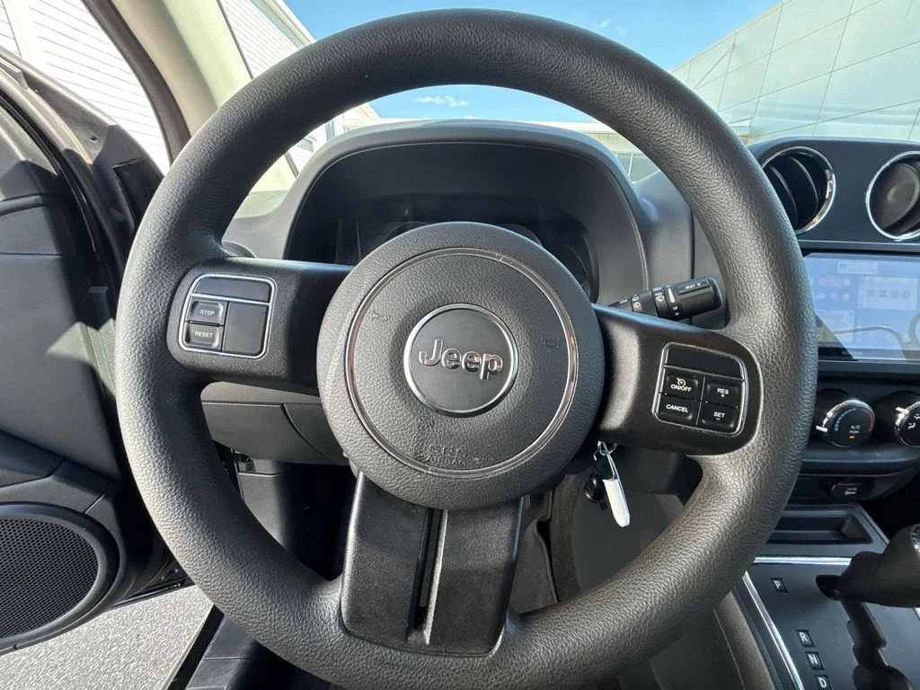 Used 2016 Black Jeep Sport image 11