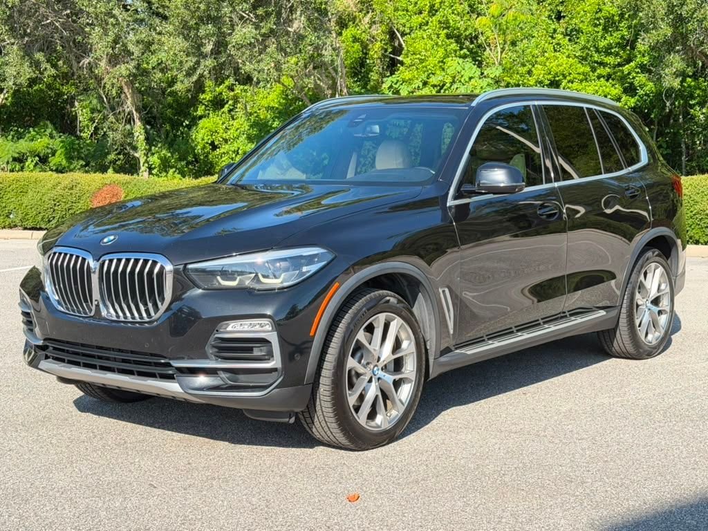 Used 2020 Black BMW xDrive40i image 1