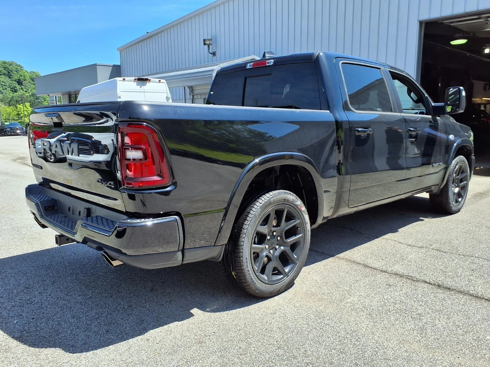 New 2026 Diamond Black Crystal Pearl-Coat Exterior Paint RAM Laramie image 2