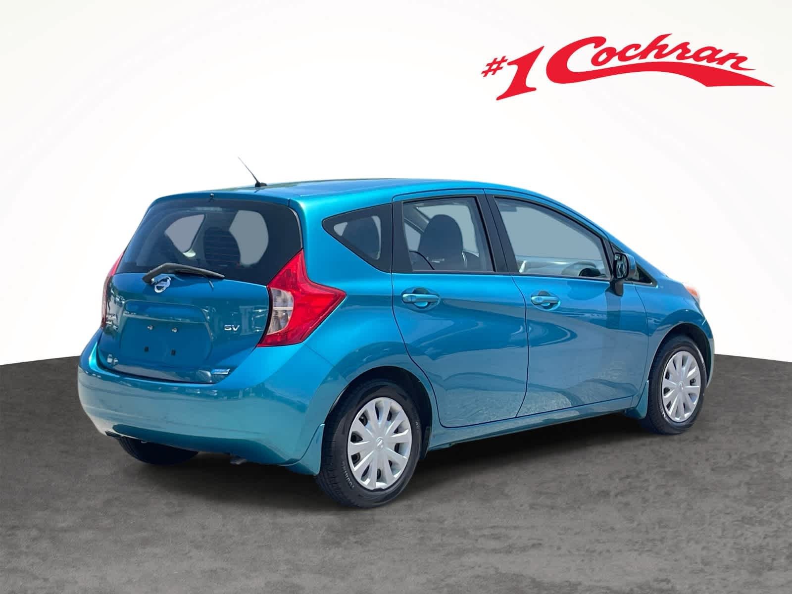 Used 2014 Metallic Peacock Nissan SV image 7