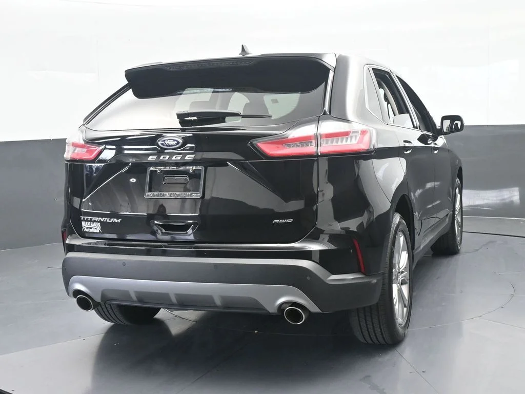 Used 2024 Black Metallic Ford Titanium image 5