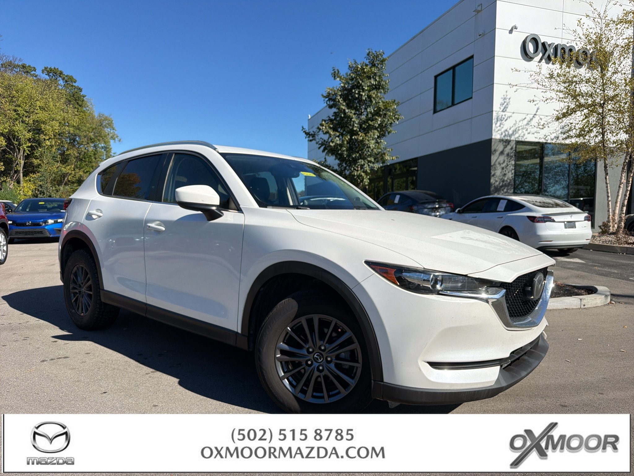 Used 2019 Snowflake White Pearl Mica Mazda Touring image 1