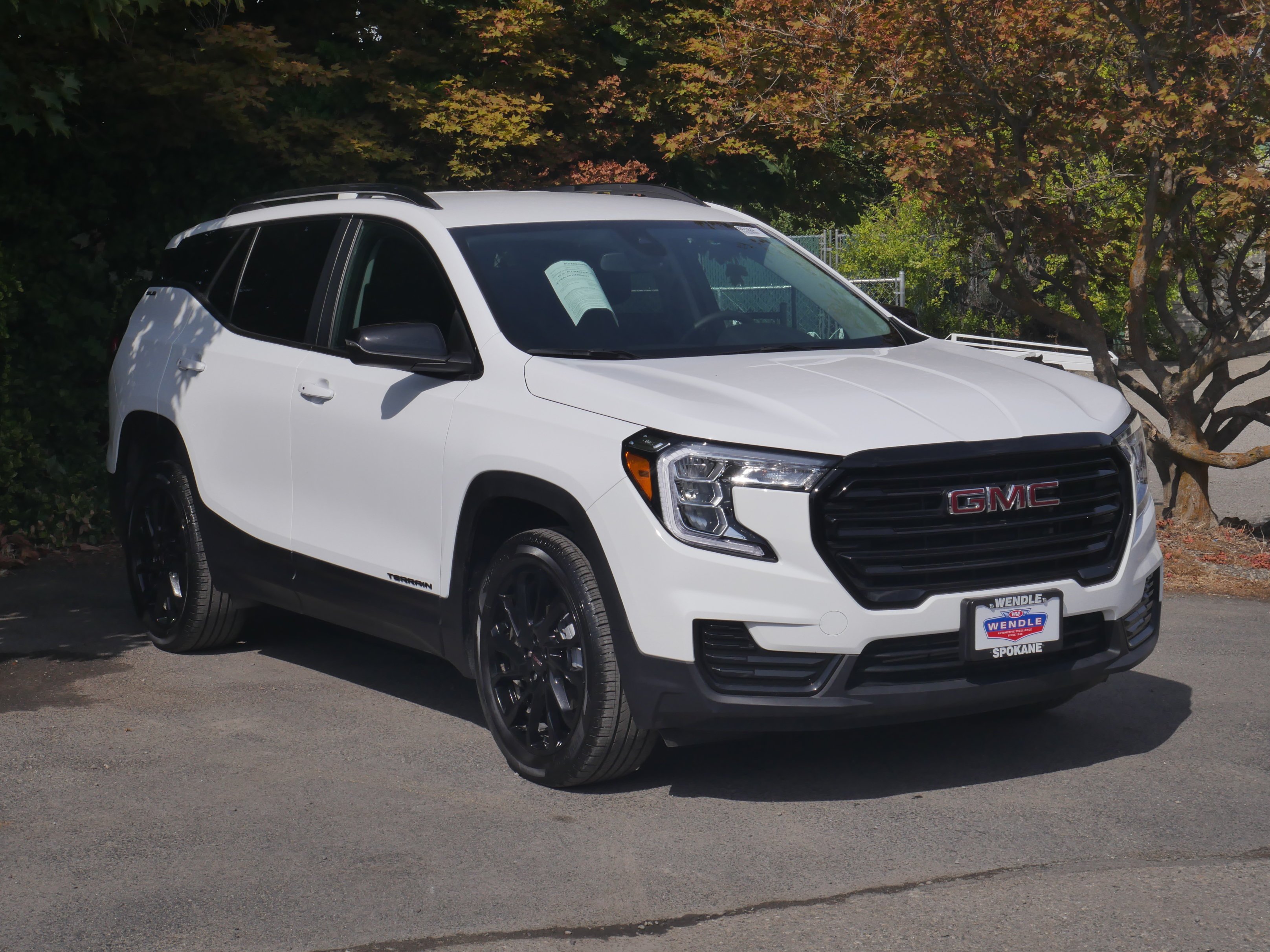 Used 2024 Summit White GMC SLE image 32