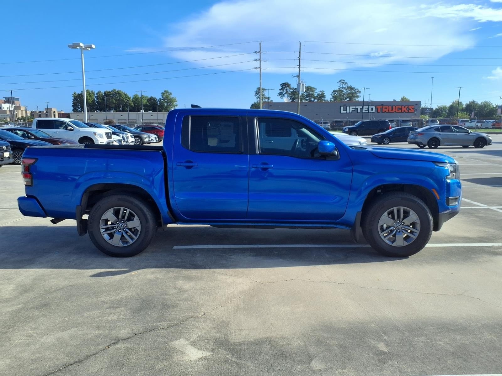 2026 Nissan Frontier SV Blue at Robbins Nissan
