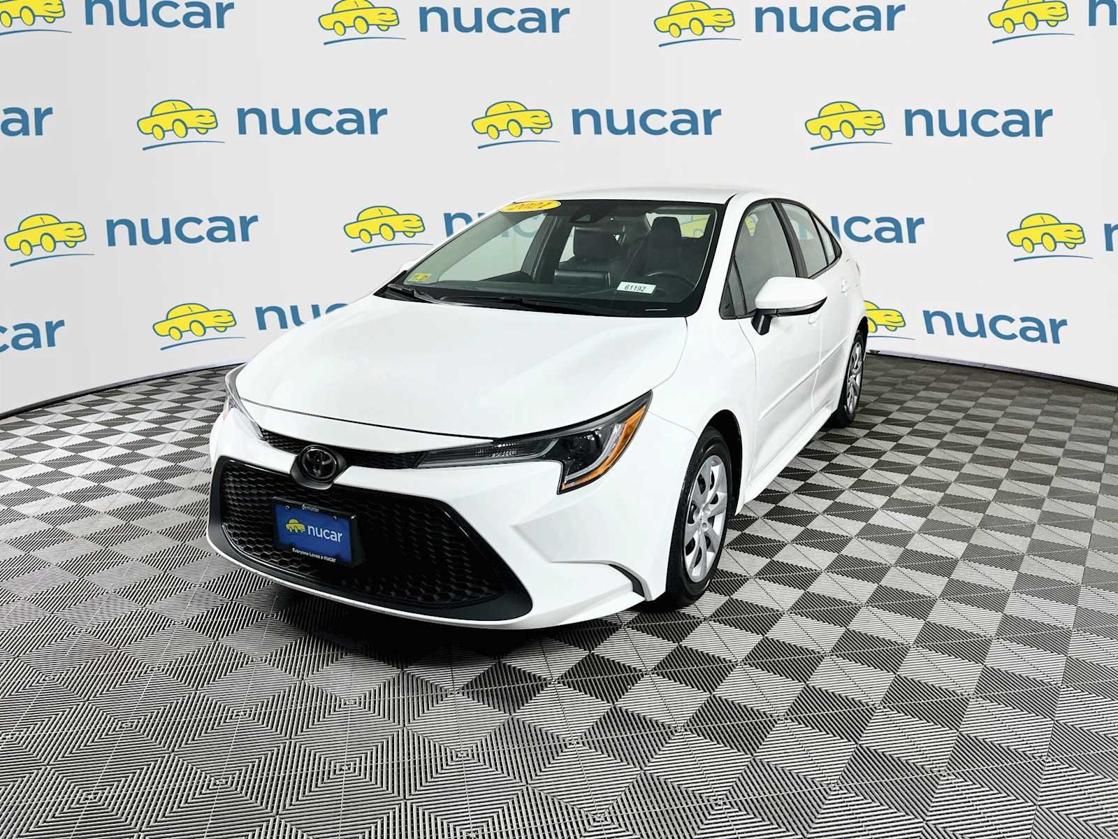 Used 2021 Super White Toyota LE image 3