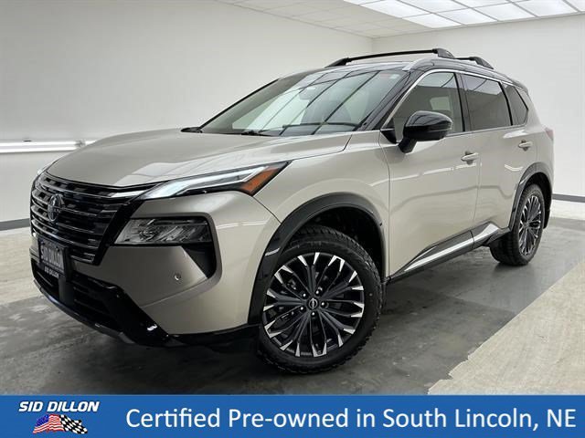 Used 2025 Champagne Silver Metallic/Super Black Nissan Platinum image 1