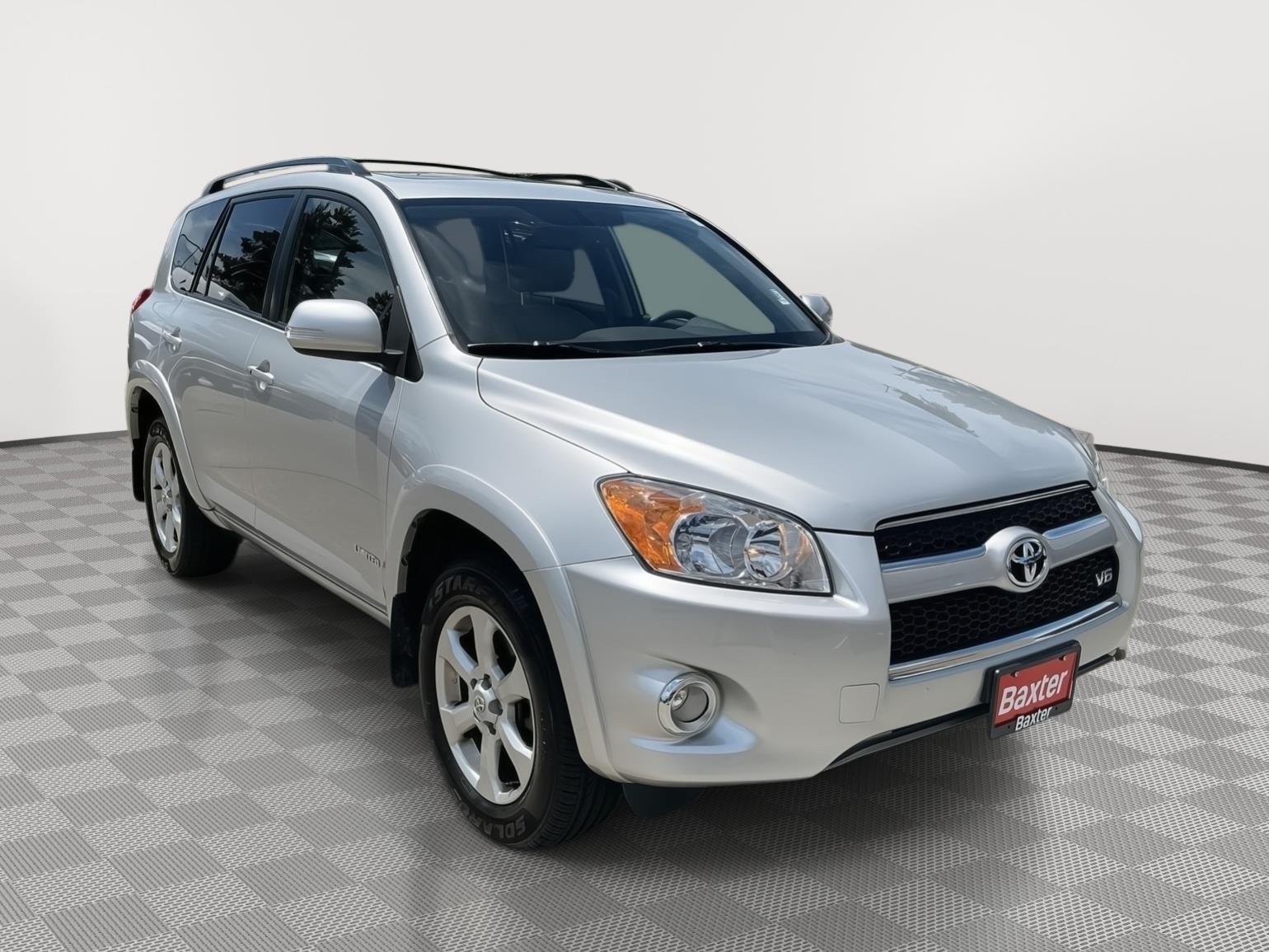 Used 2011 Classic Silver Metallic TOYOTA Limited image 1