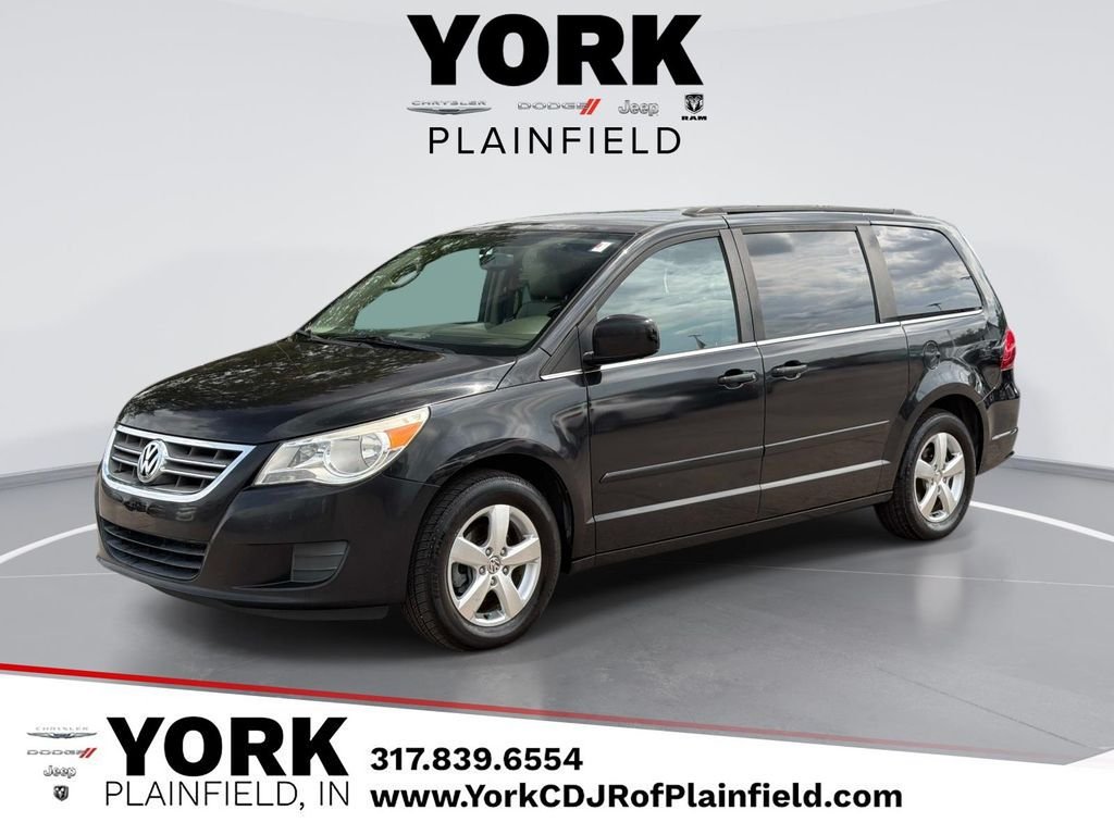 Used 2011 Black Volkswagen SE image 1