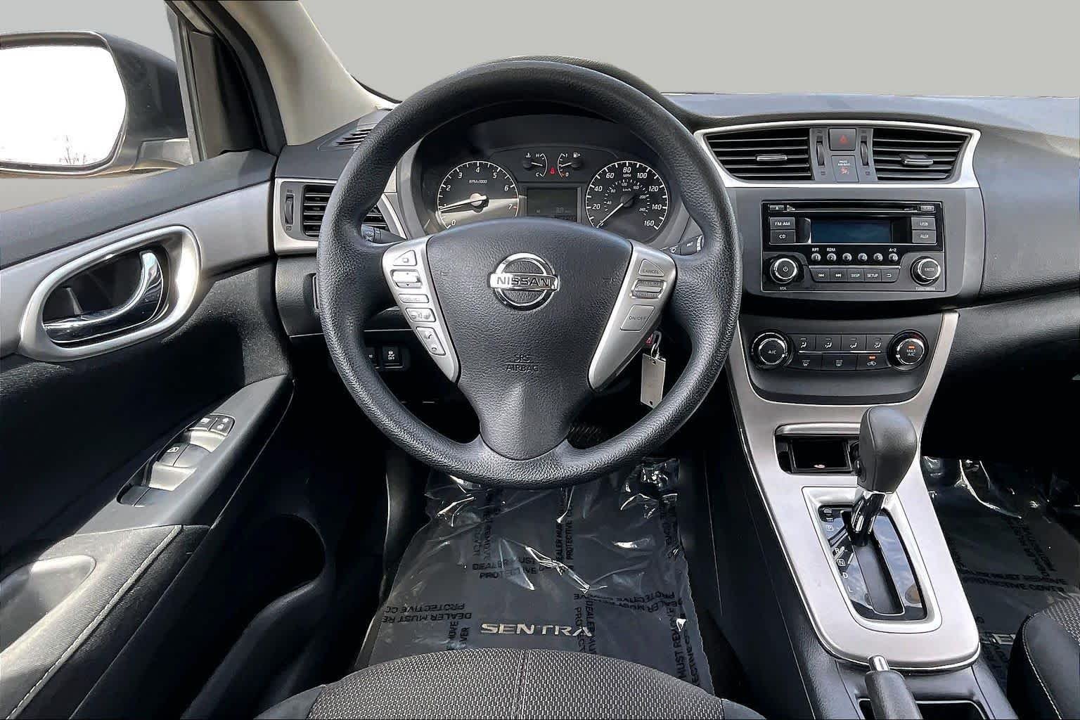 Used 2015 Brilliant Silver Nissan S image 5