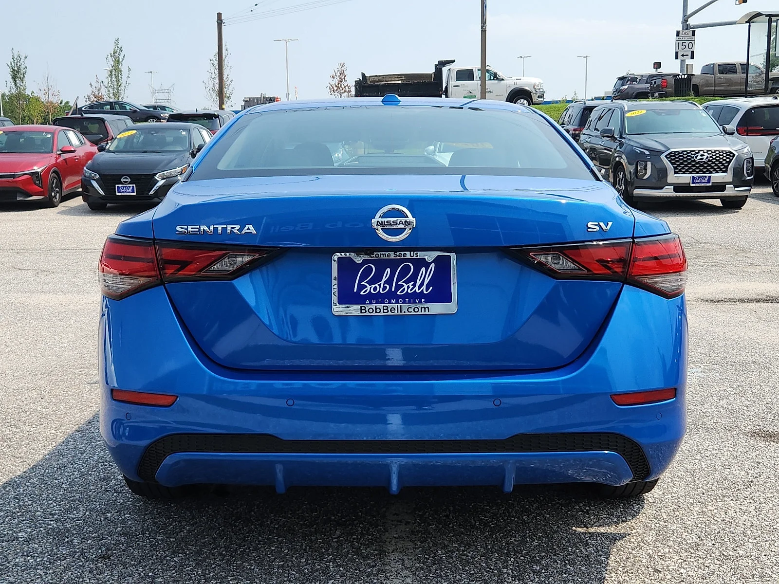 Used 2023 Electric Blue Metallic Nissan SV image 5