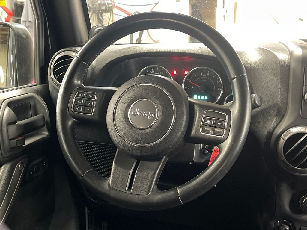 Used 2013 Black Jeep Unlimited Sport image 20