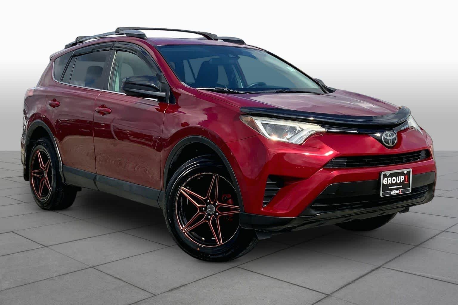 Used 2018 Ruby Flare Pearl Toyota LE image 3
