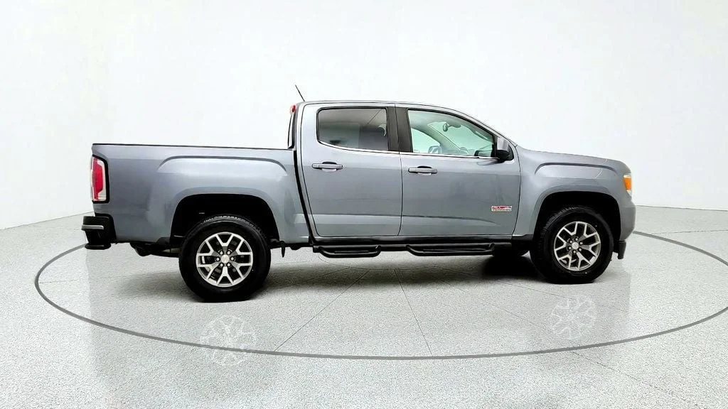 Used 2019 Satin Steel Metallic GMC 4WD Crew Cab 128.3