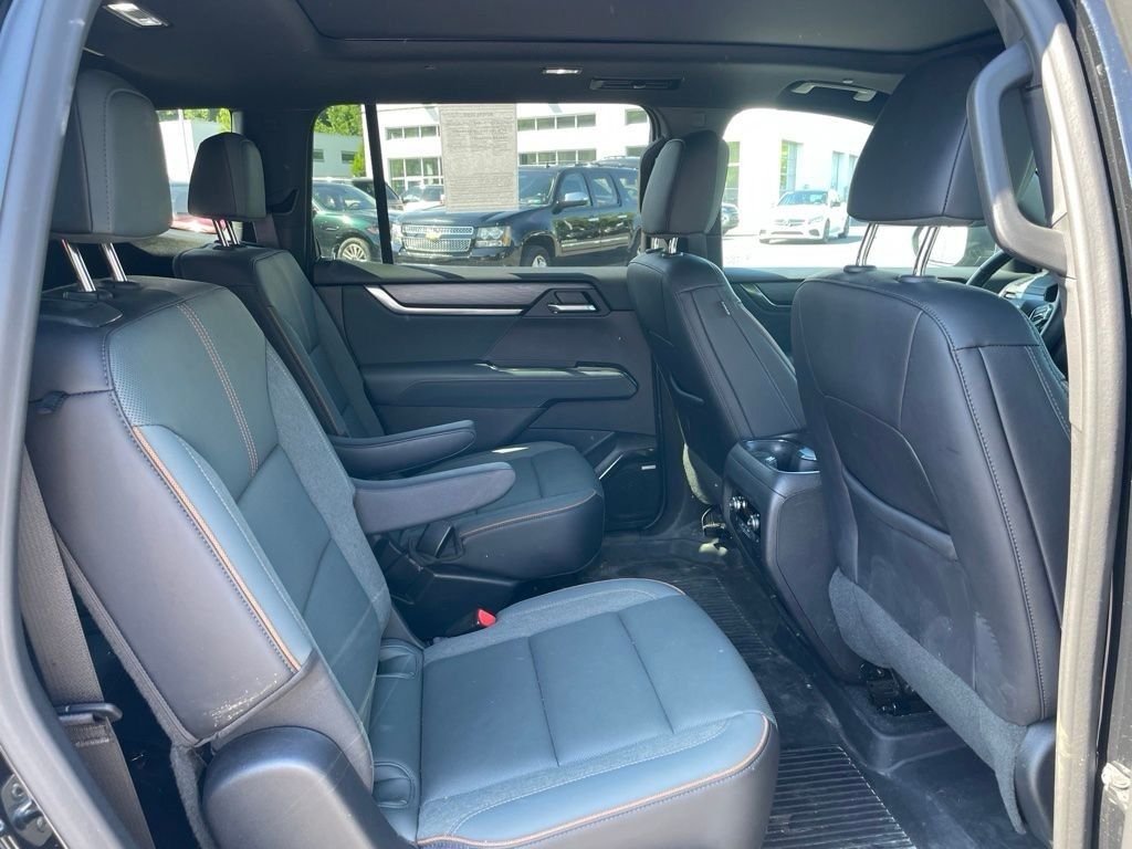 Used 2024 Ebony Twilight Metallic GMC AT4 image 16
