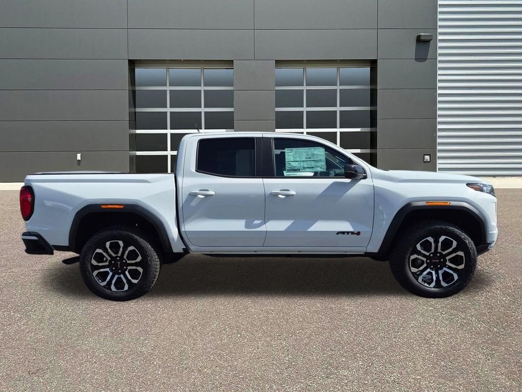 New 2026 Summit White GMC 4WD AT4 image 4