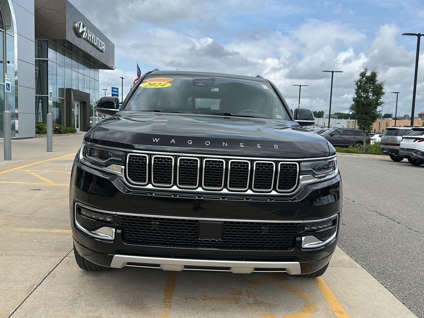 Used 2024 Diamond Black Crystal Pearlcoat Jeep Series II image 6