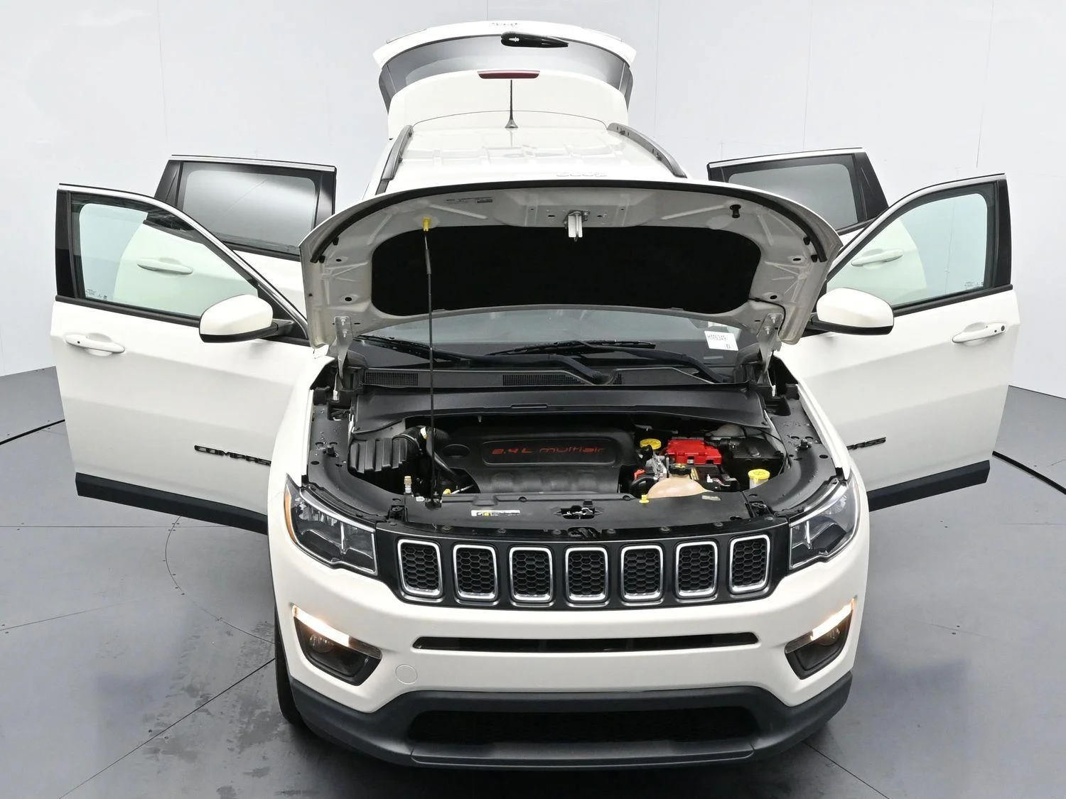 Used 2019 White Clearcoat Jeep Latitude image 42