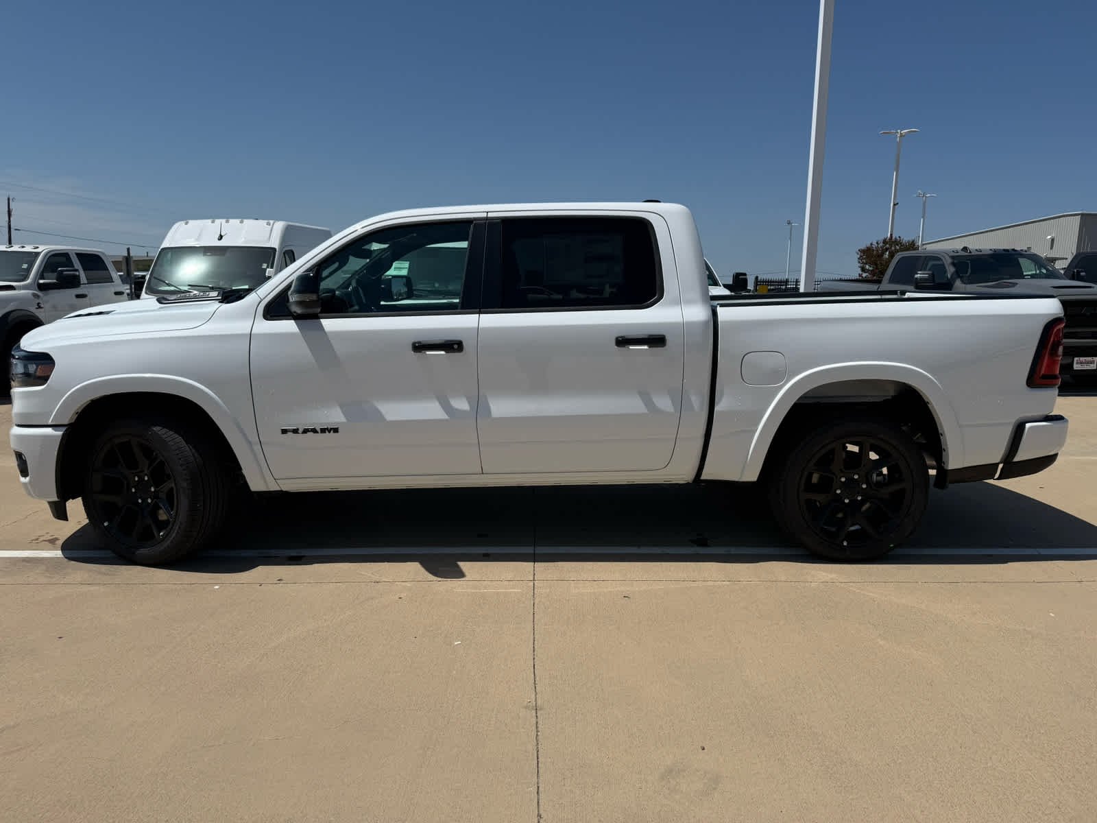 New 2026 Bright White Clearcoat Ram Laramie image 9