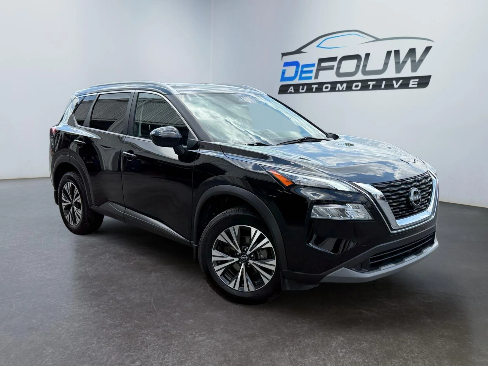 Used 2023 Super Black Nissan SV image 1