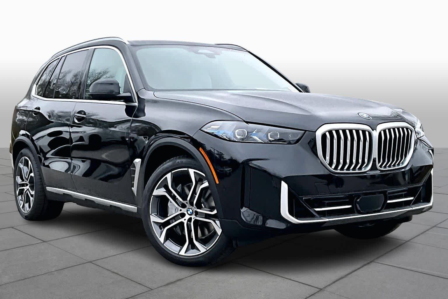 New 2026 Black Sapphire Metallic BMW xDrive50e image 2