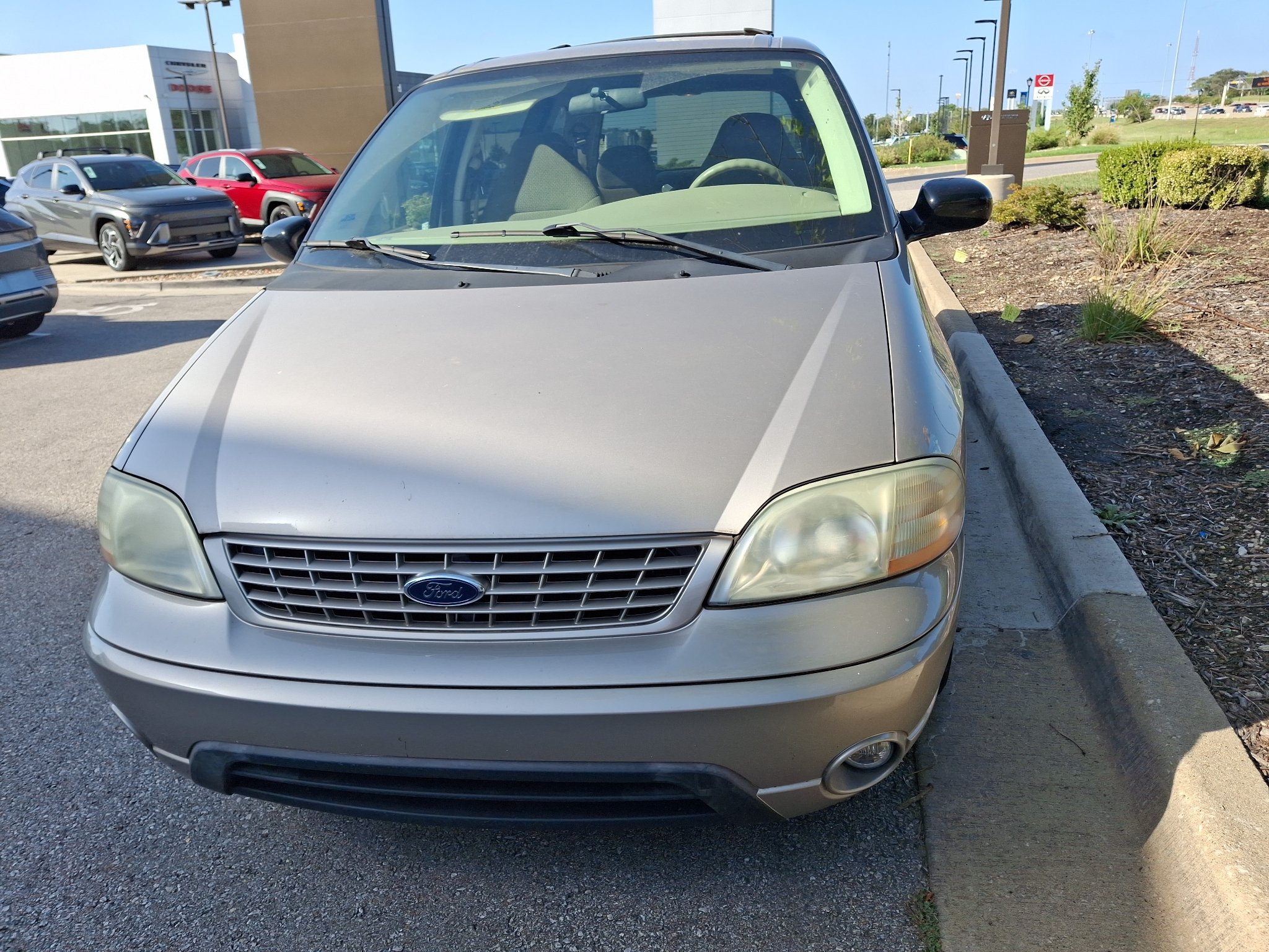 Used 2003 Silver Frost Clearcoat Metallic Ford LX image 6