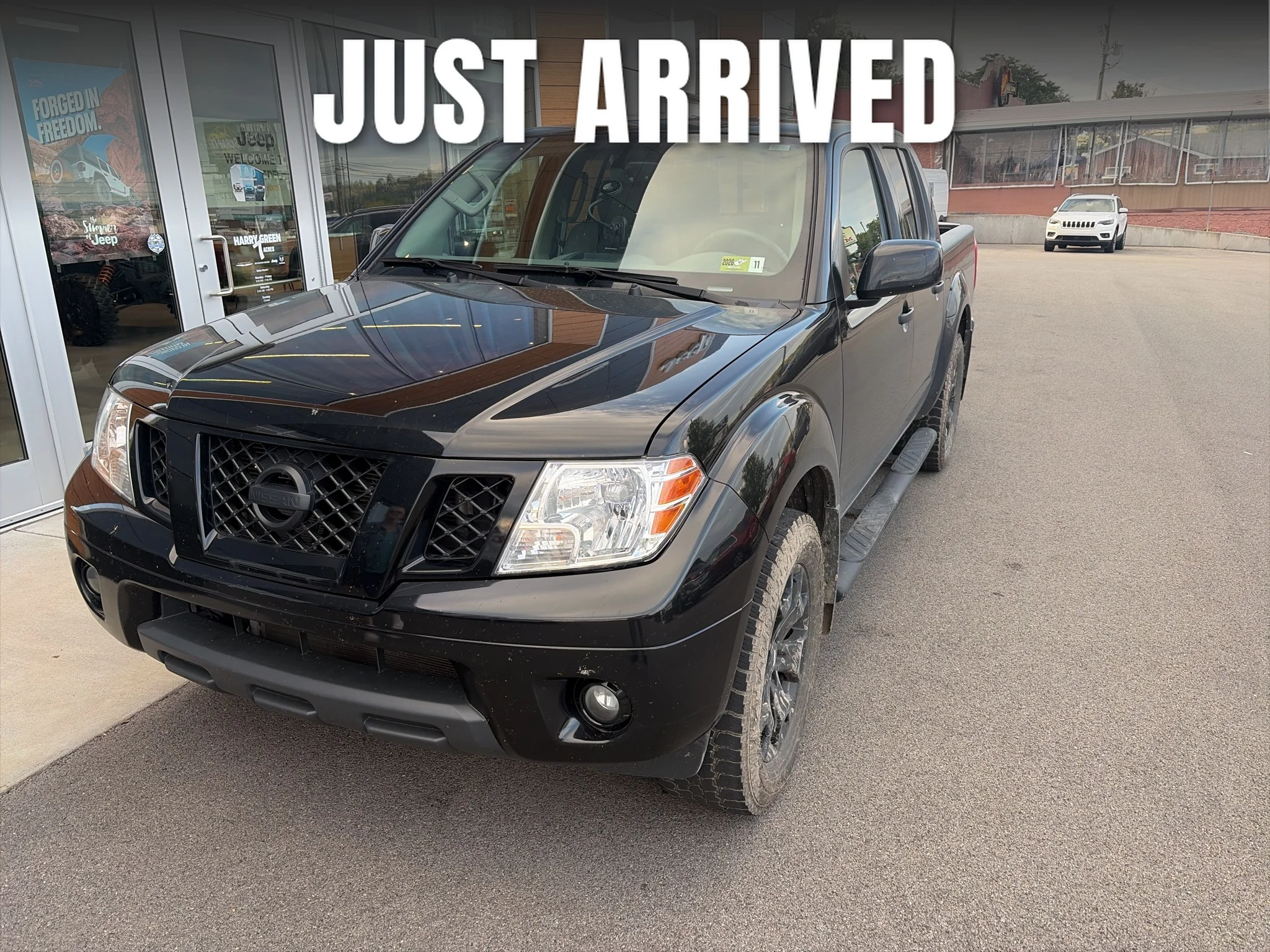 Used 2020 Magnetic Black Pearl Nissan SV image 1