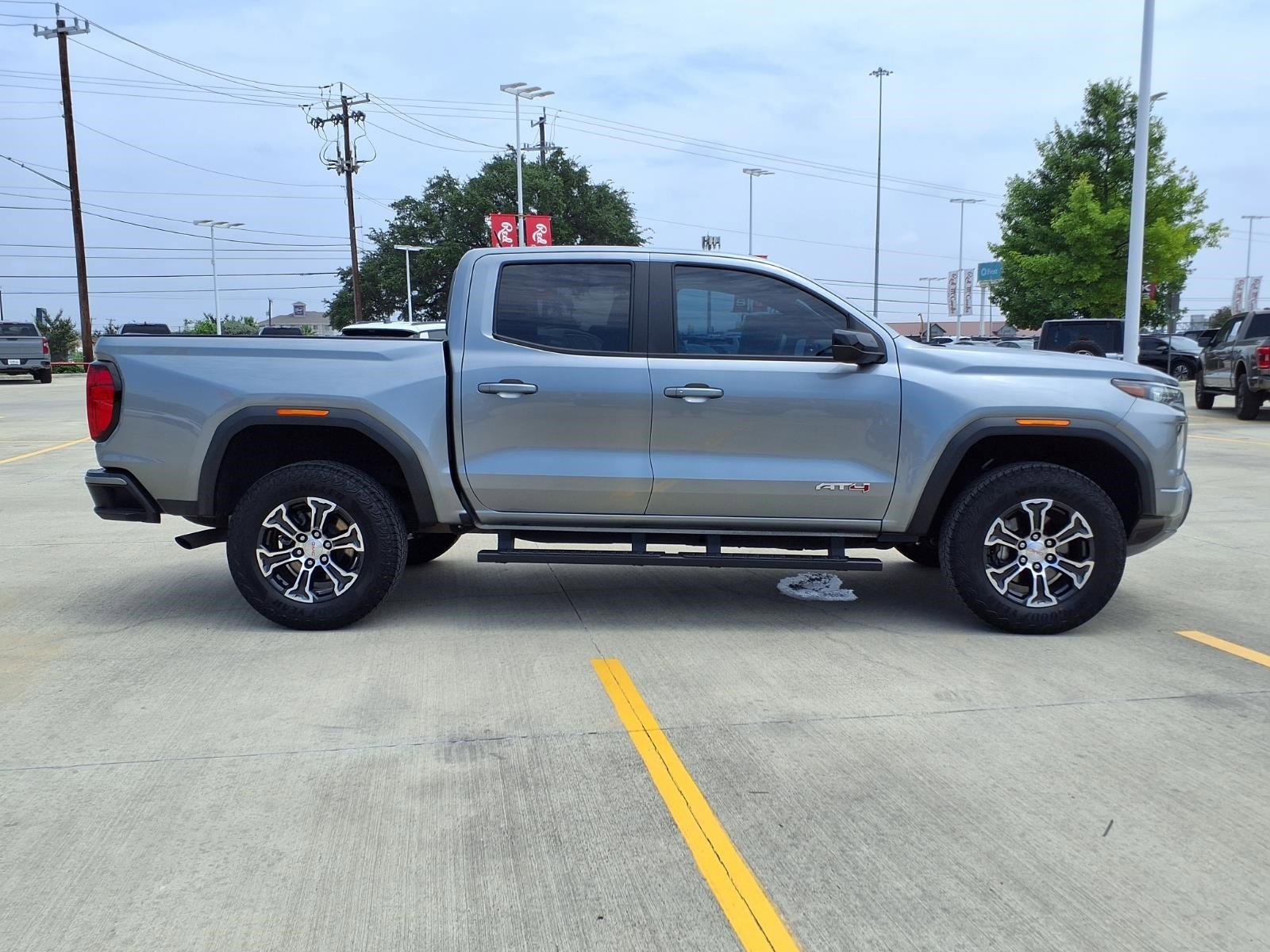 Used 2023 Sterling Metallic GMC 4WD AT4 image 4