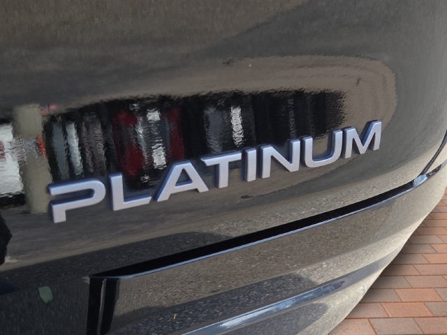 Certified Used 2025 Black Nissan Platinum image 6