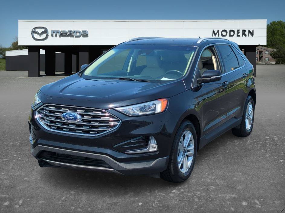 Used 2020 Black Ford SEL image 1