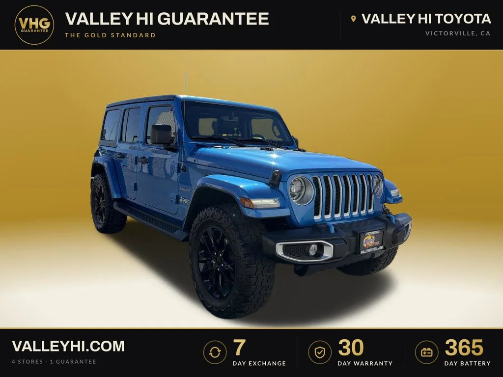 Used 2022 Blue Jeep Unlimited Sahara 4xe image 1
