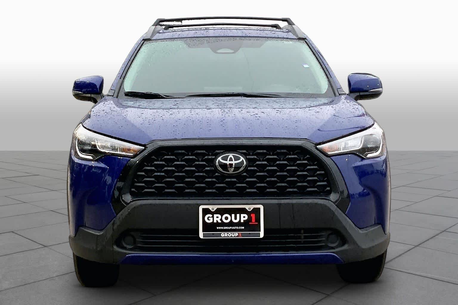 Used 2024 Blue Crush Metallic Toyota LE image 4