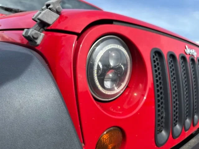 Used 2012 Flame Red Jeep Sport image 15