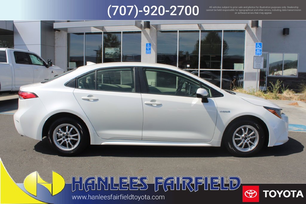 Used 2021 White Toyota LE image 6