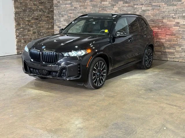 Used 2025 Black Sapphire Metallic BMW xDrive50e image 3