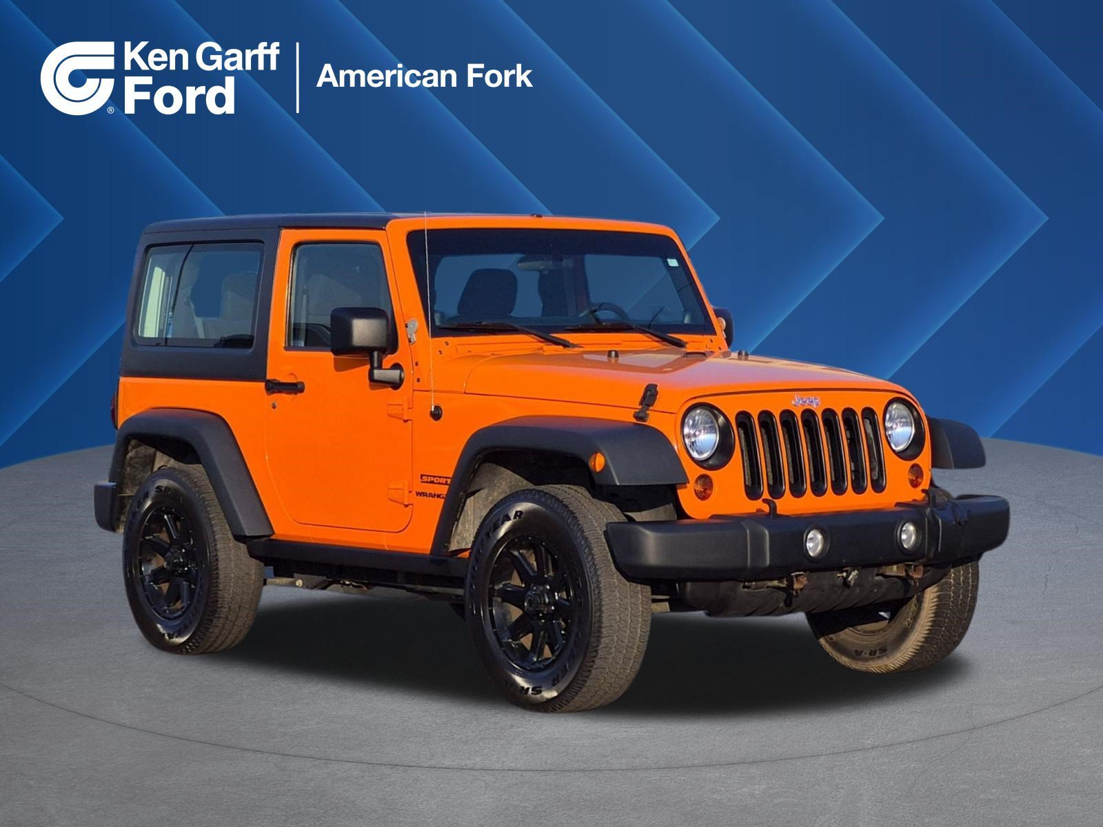 Used 2013 Crush Clearcoat Jeep Sport image 1
