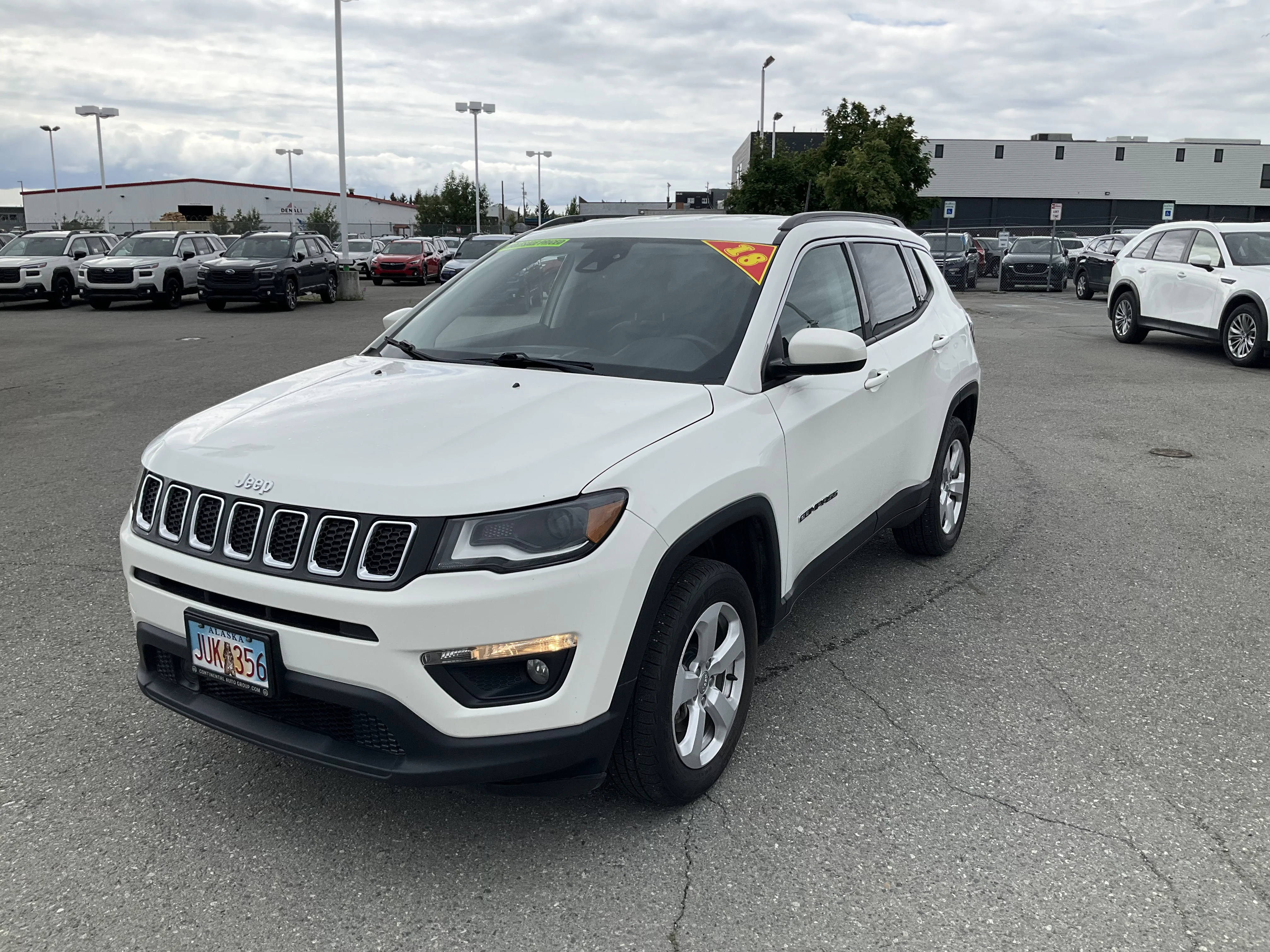 Used 2018 White Clearcoat Jeep Latitude image 1