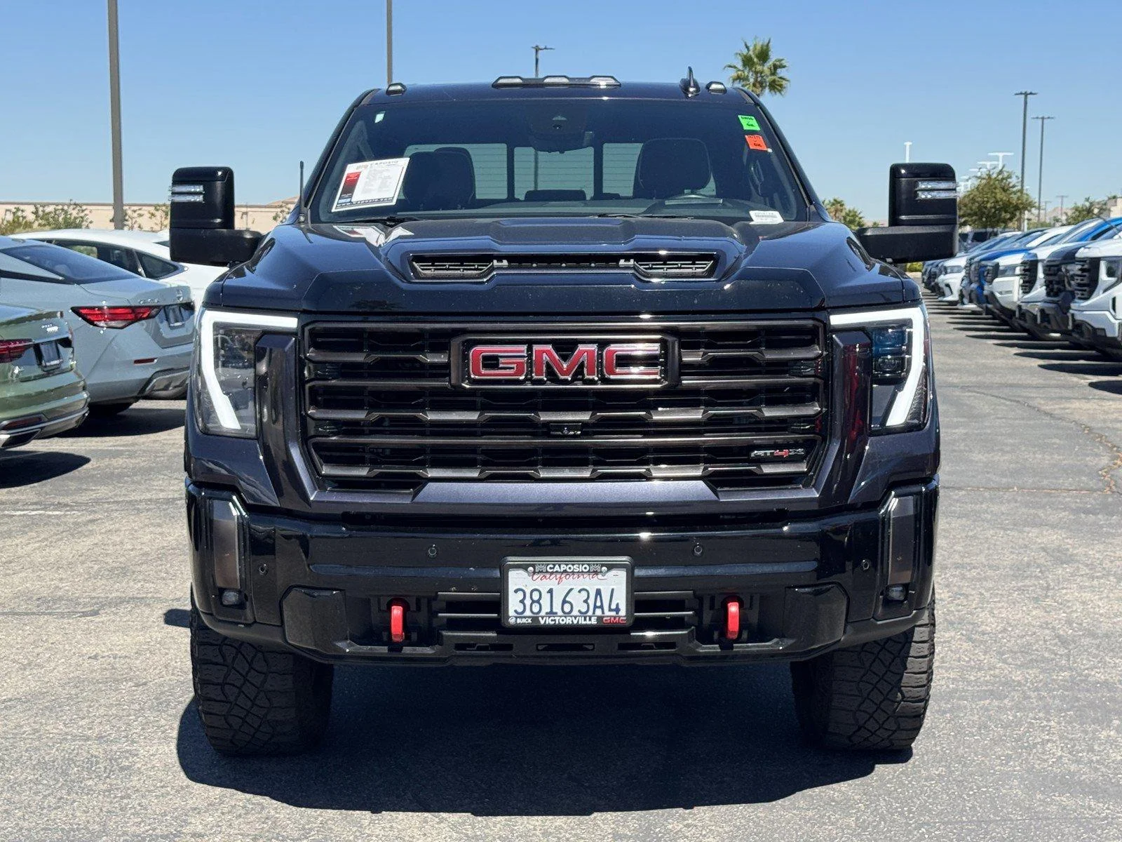 Used 2024 Titanium Rush Metallic GMC AT4X image 2