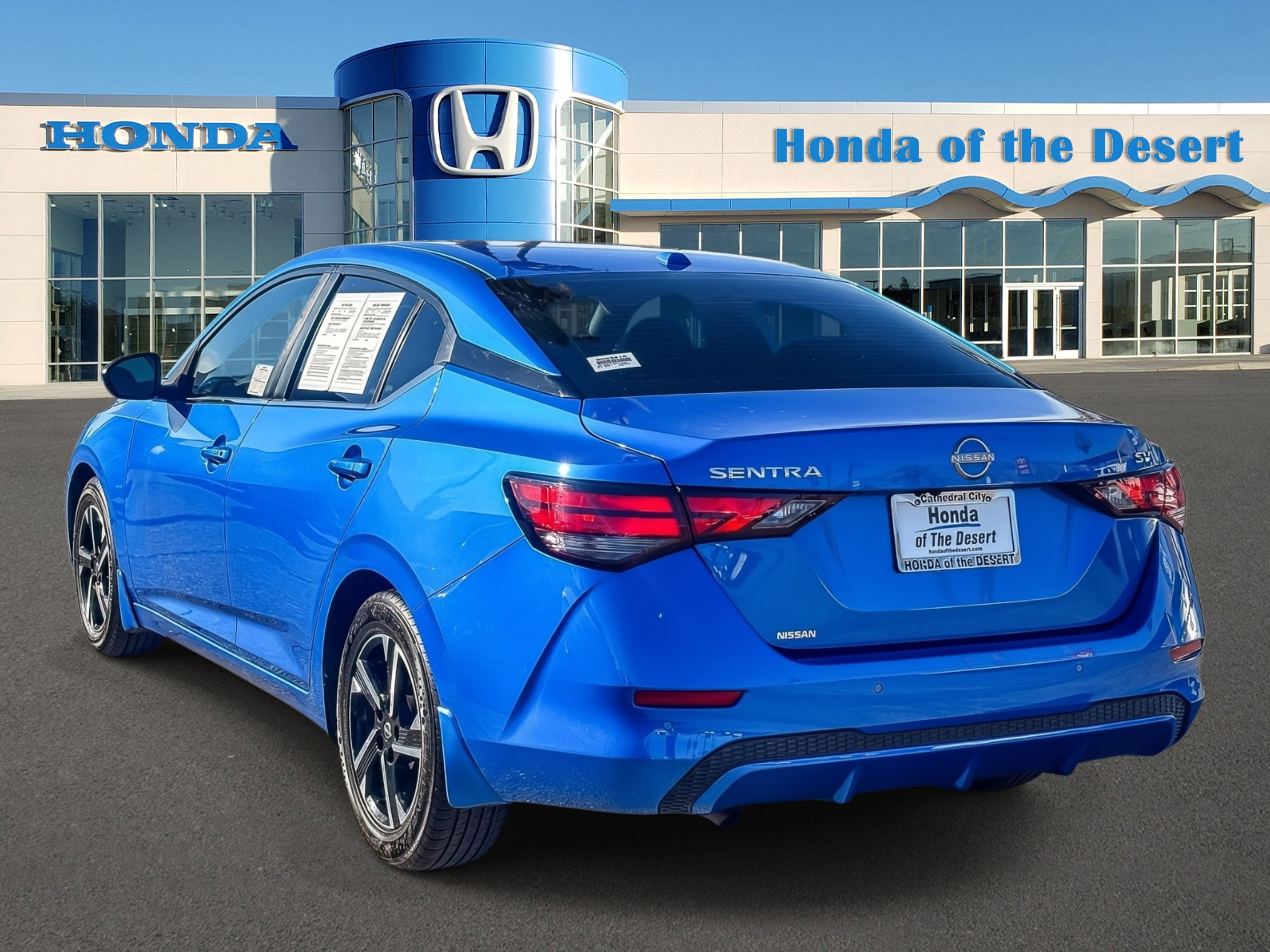 Used 2024 Electric Blue Metallic Nissan SV image 4