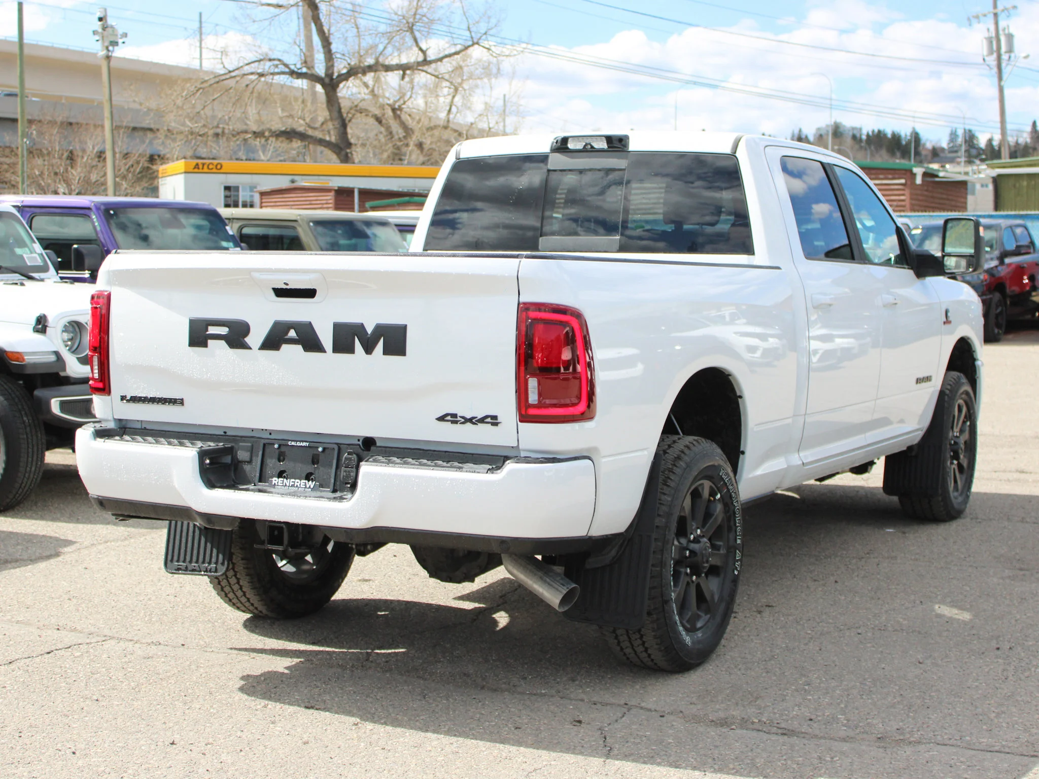 New 2026 White RAM Laramie* image 5