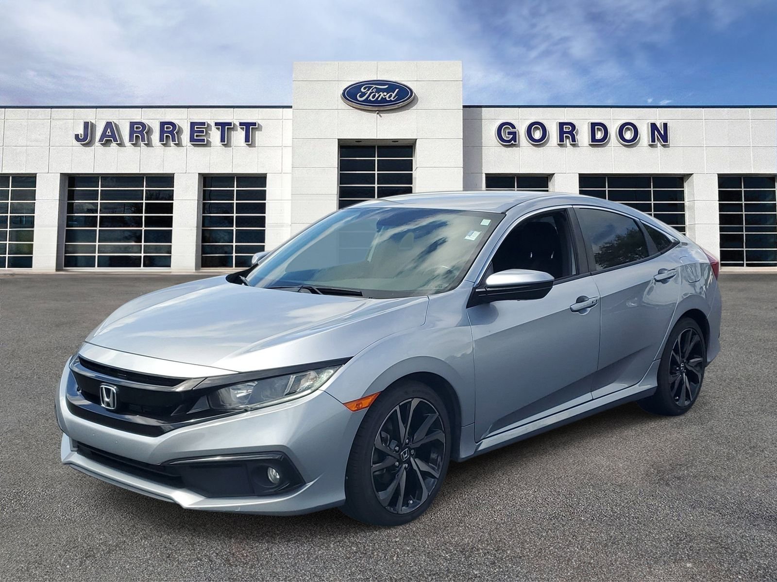 Certified 2021 Honda Civic Sport with VIN 2HGFC2F87MH514070 for sale in Seminole, FL