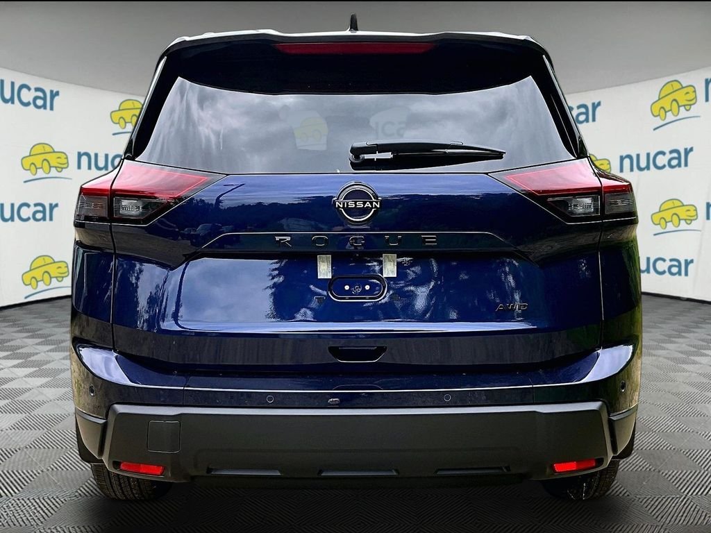 New 2026 Blue Nissan Dark Armor image 4