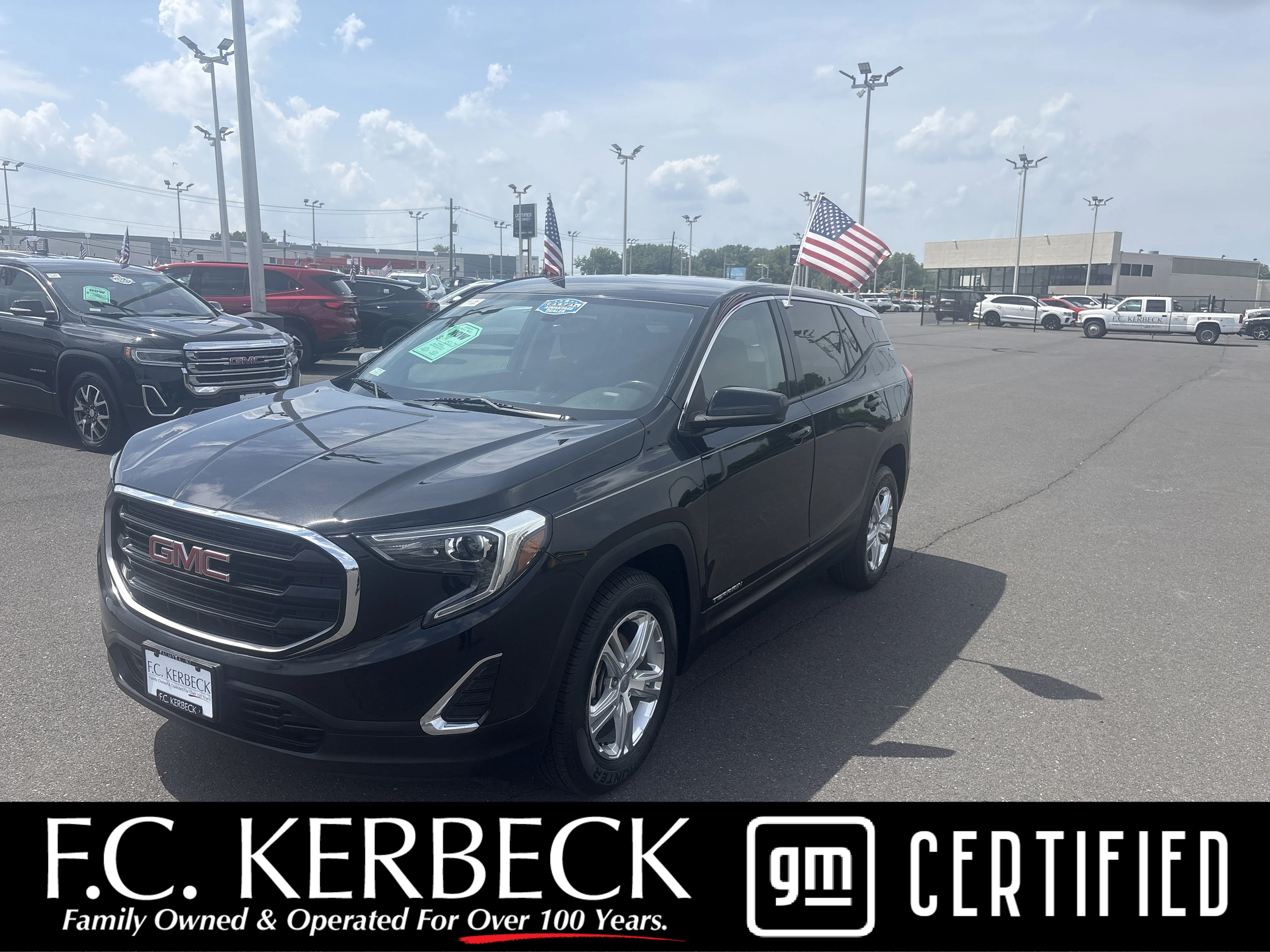 Used 2018 Ebony Twilight Metallic GMC SLE image 1