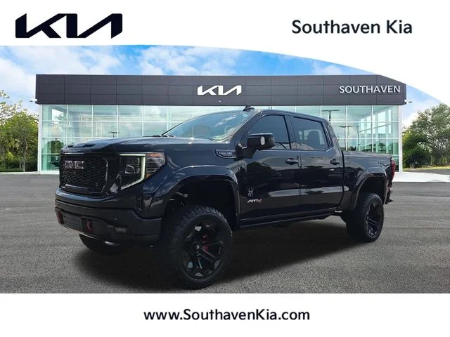 Used 2024 Black GMC AT4 image 1