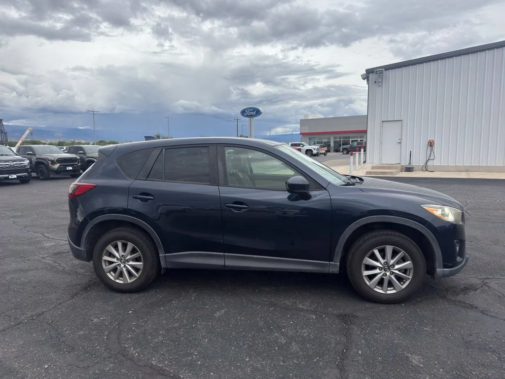 Used 2015 Crystal Blue Mazda Touring image 4