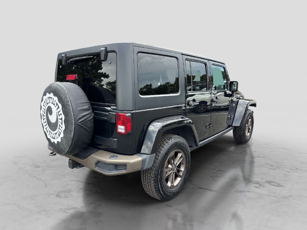 Used 2016 Black Jeep Unlimited Sahara image 5